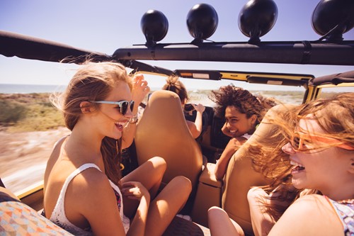 teens driving in jeep